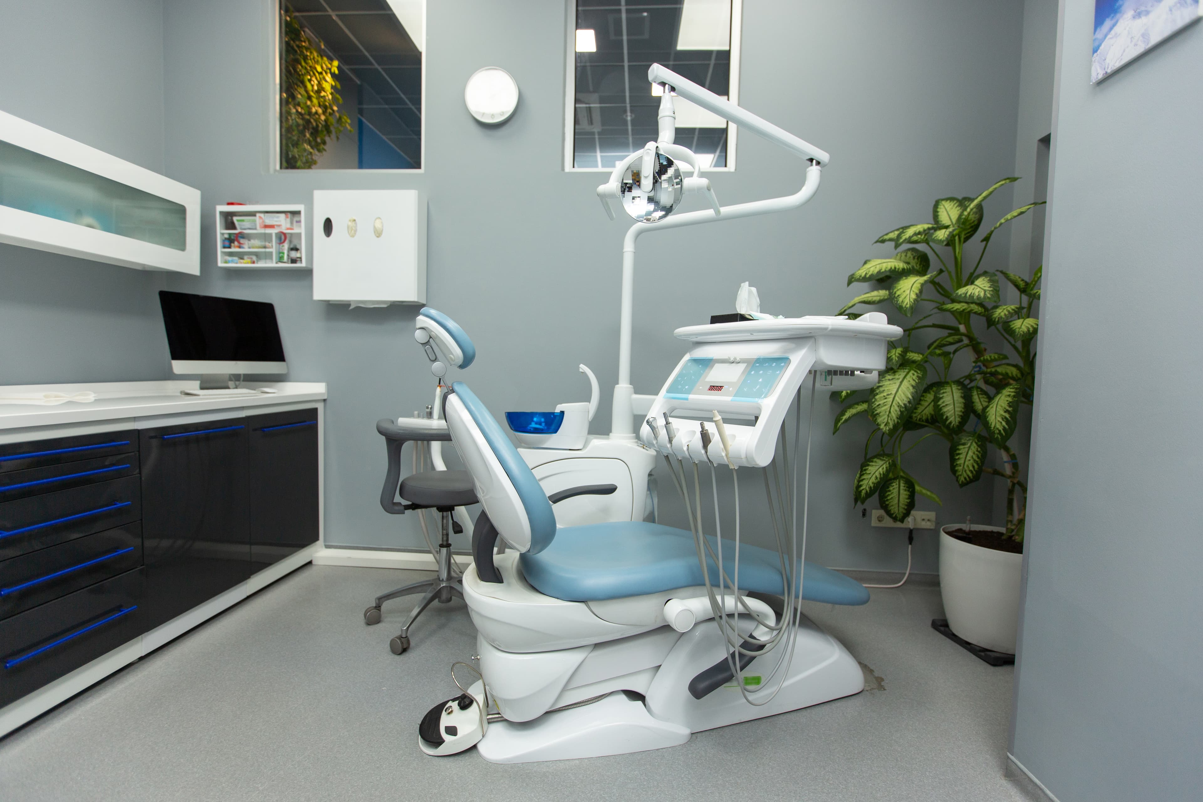 Smiling patient with dentist